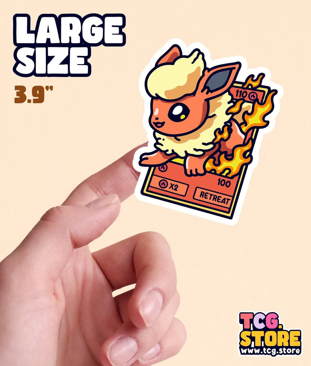 a hand holding a sticker with a picture of a cat on it