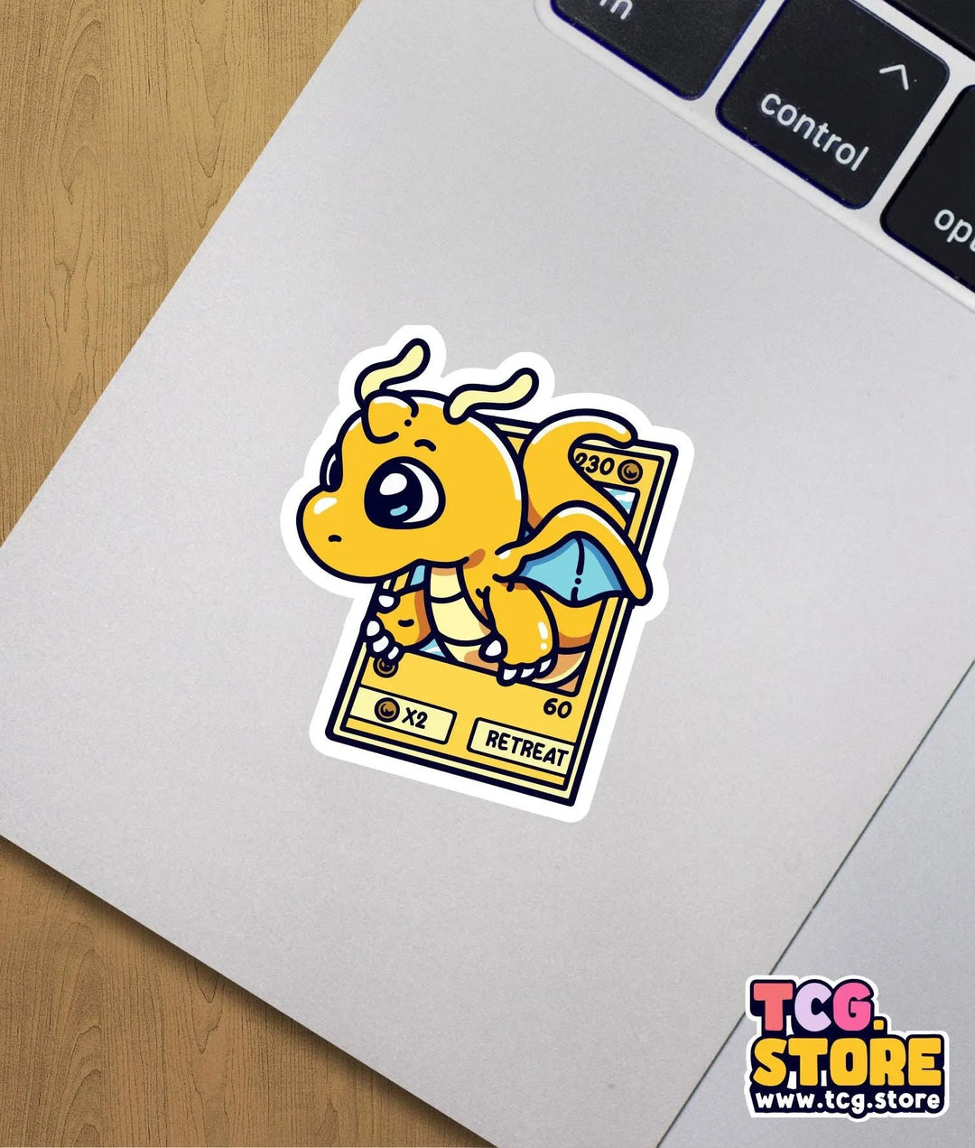 a sticker of a yellow dragon on a laptop