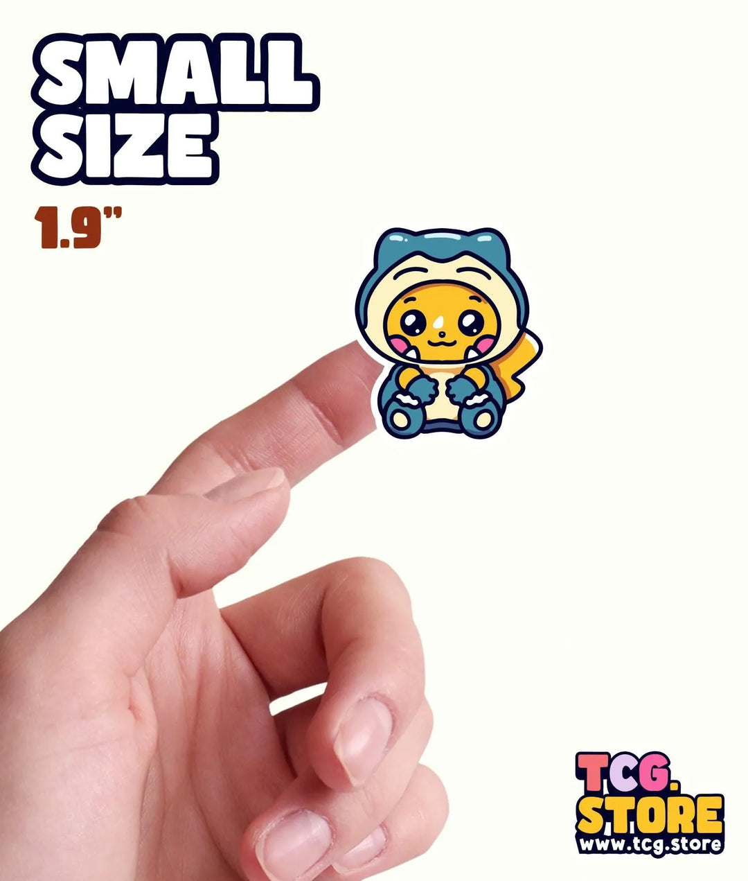 a hand is pointing at a small sticker
