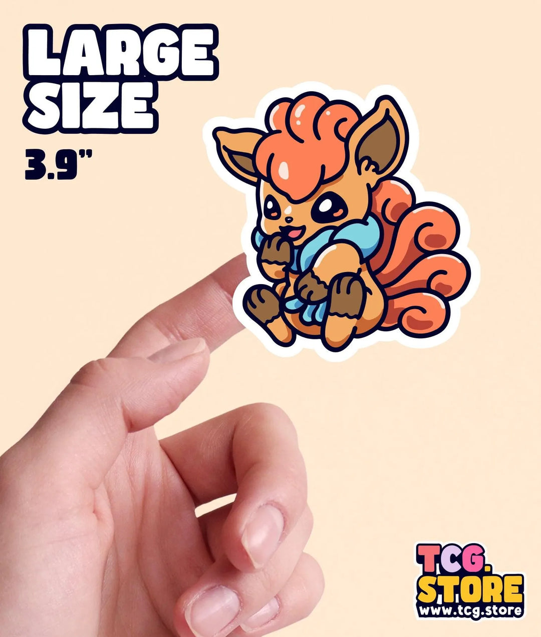 a hand holding a small sticker of a squirrel