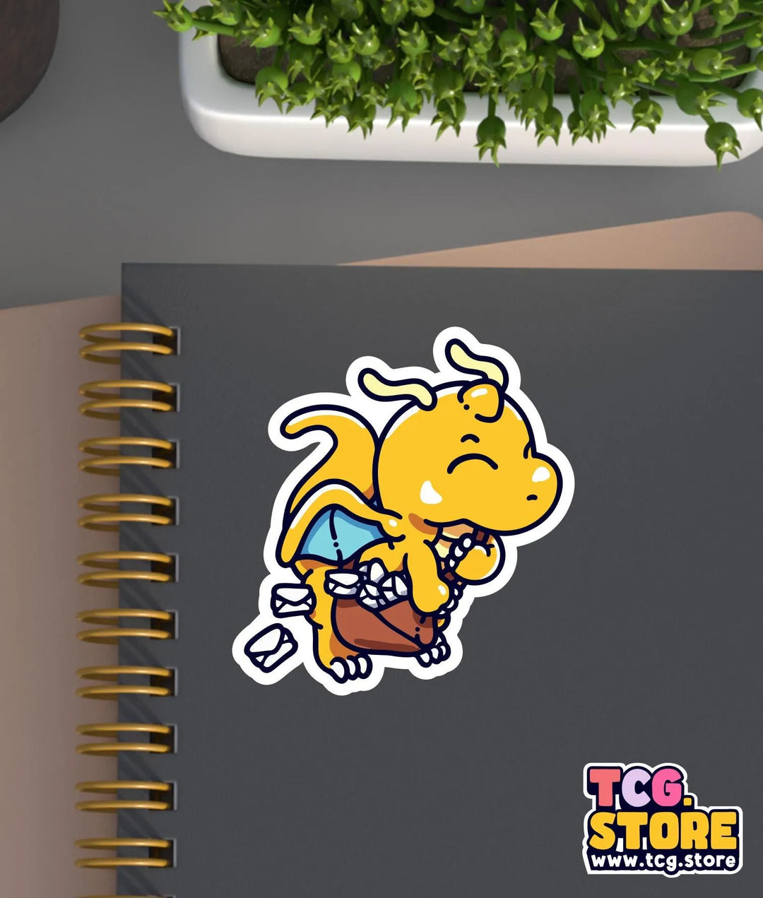 a notebook with a sticker of a cartoon dog