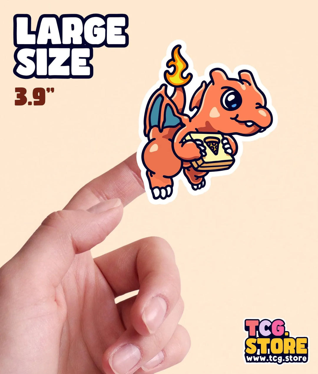 a hand holding a small sticker of a dragon