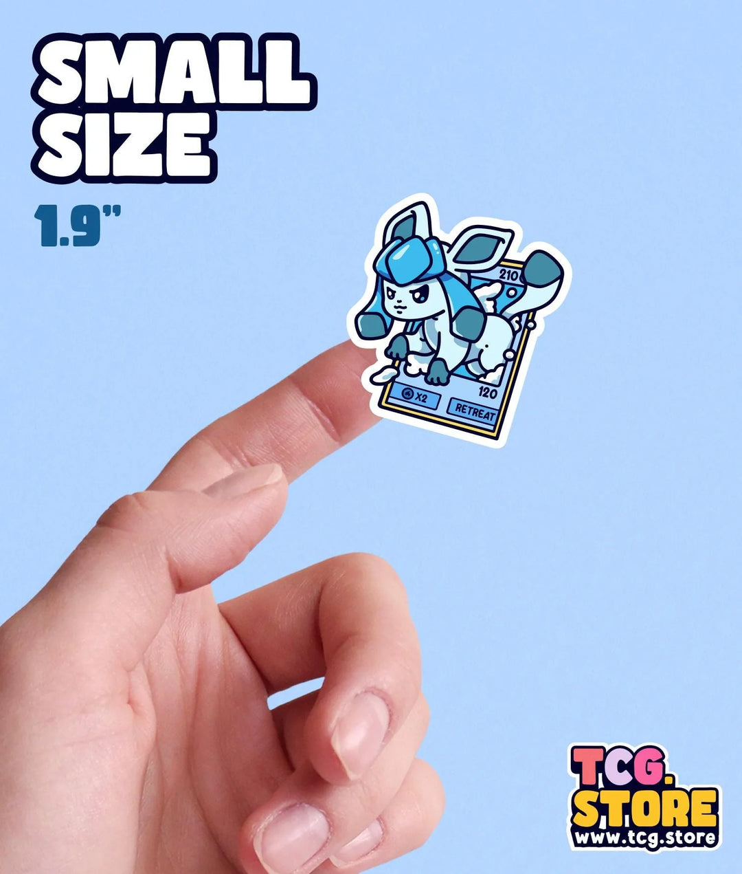 a hand holding a small sticker of a dog