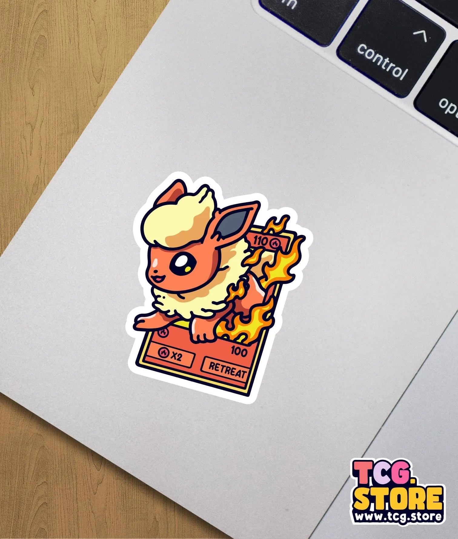 a sticker of a cat on a computer keyboard