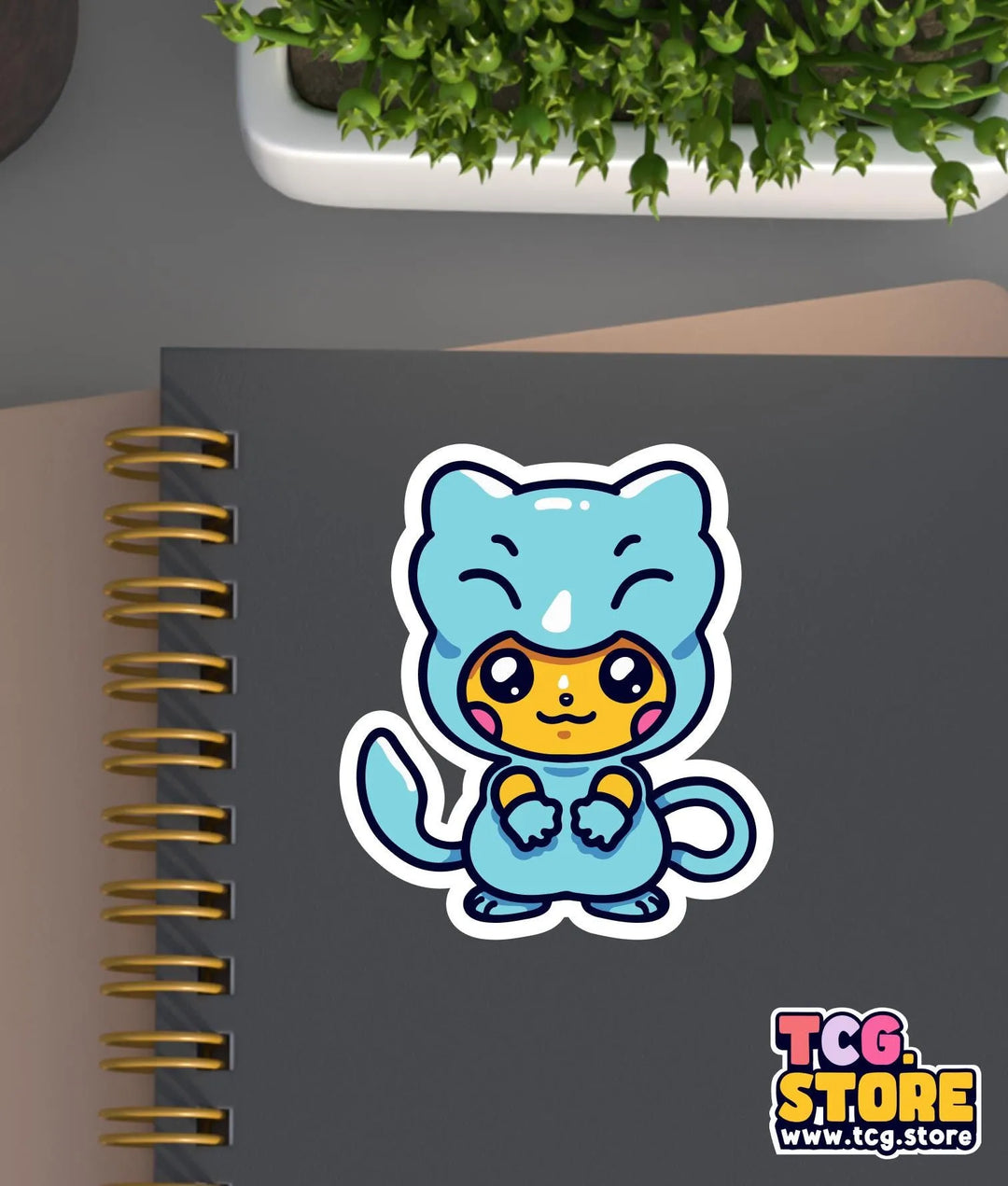 a notebook with a sticker of a cat on it
