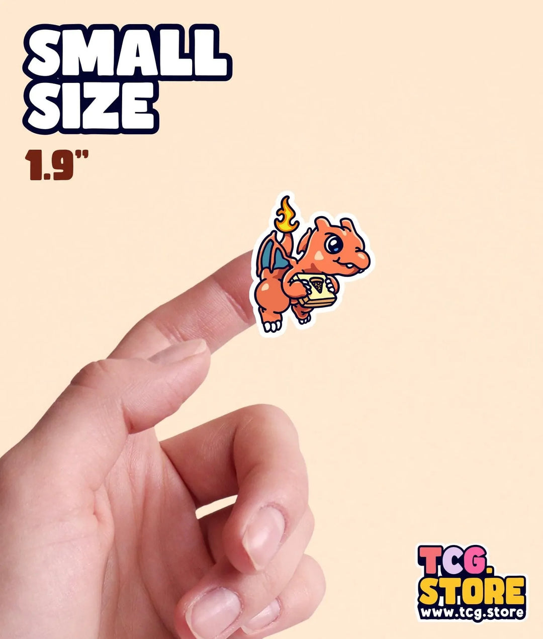 a hand holding a small sticker of a small animal