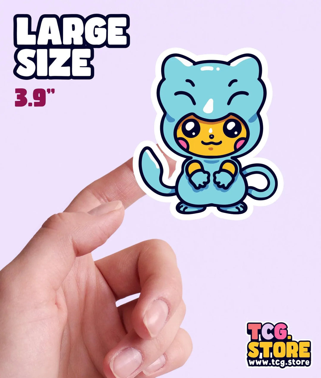 a hand holding a small sticker of a cat