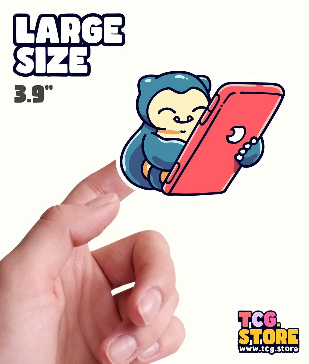 a hand holding a small sticker with a monkey on it