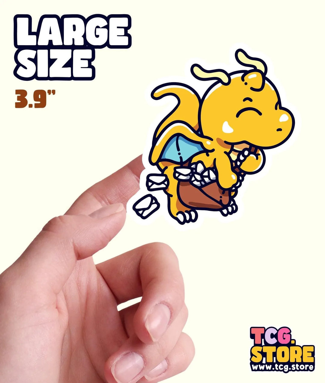 a hand holding a small sticker of a dog