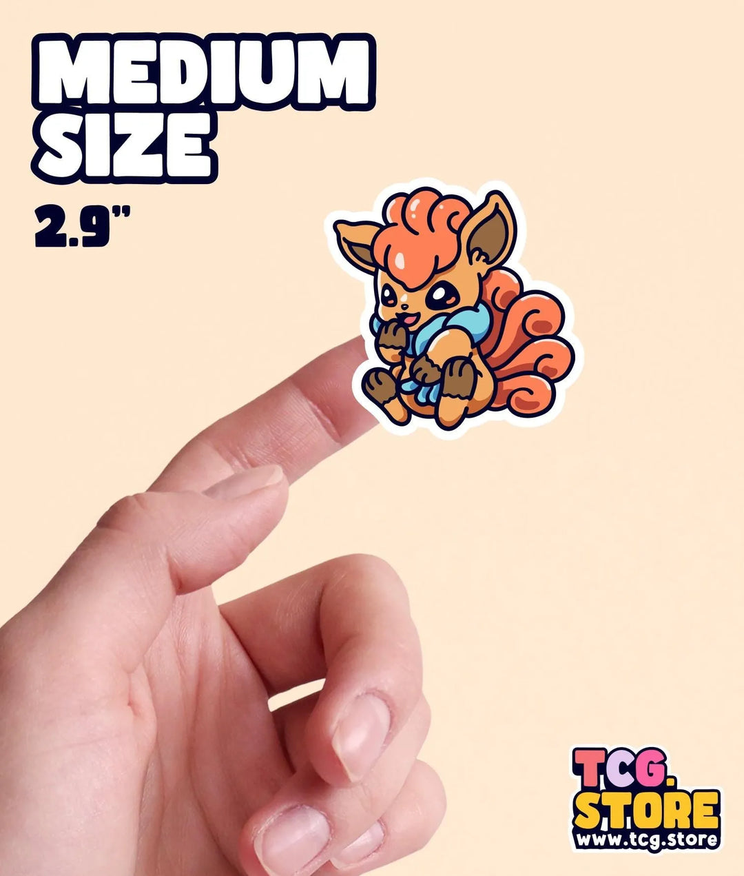 a hand holding a small sticker of a squirrel