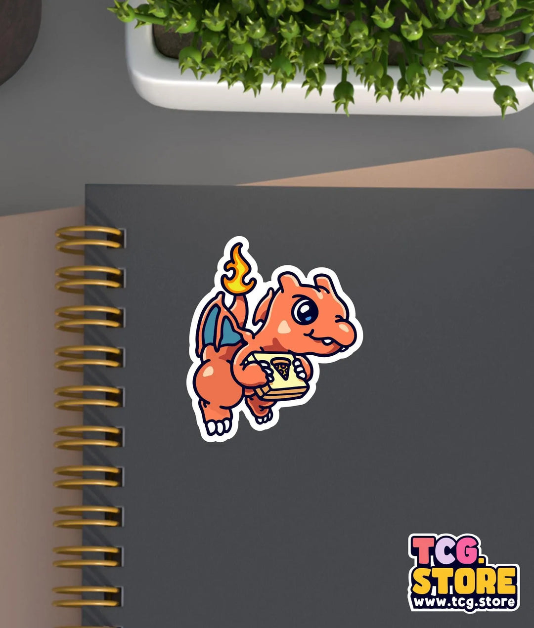 a notebook with a sticker of a dinosaur