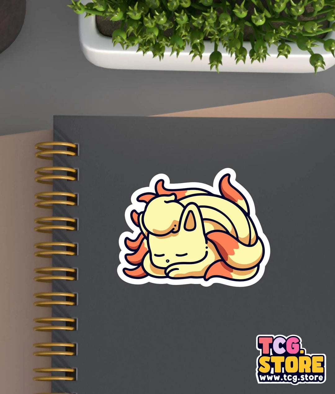 a notebook with a sticker of a cartoon character