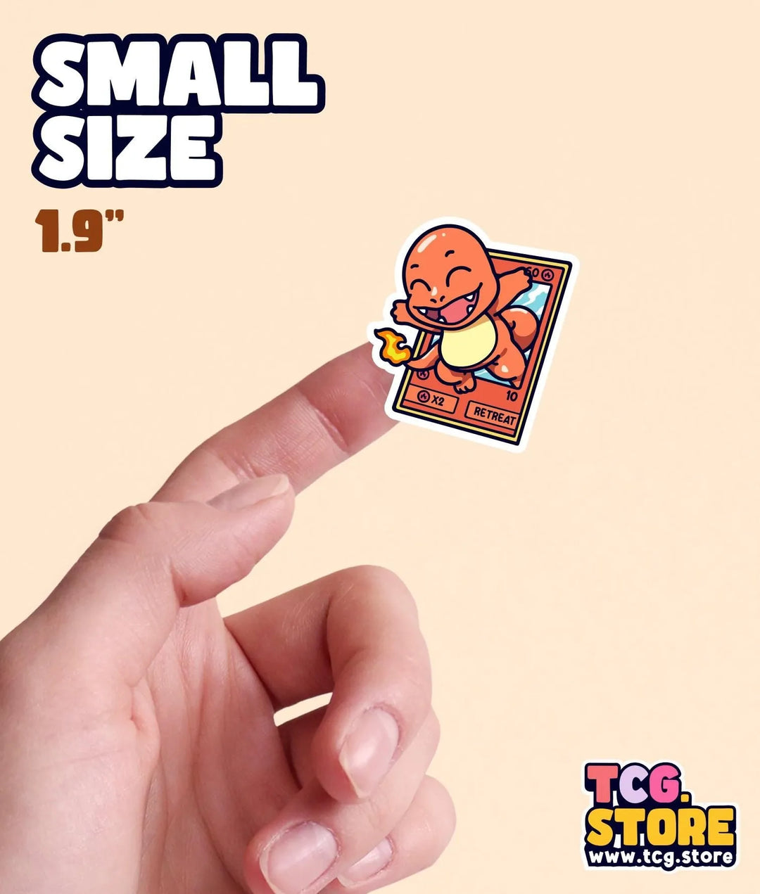 a hand holding a small sticker with a small sticker on it