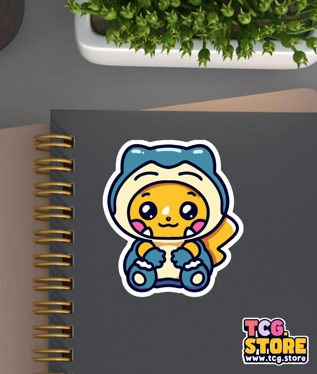a notebook with a sticker of a cat