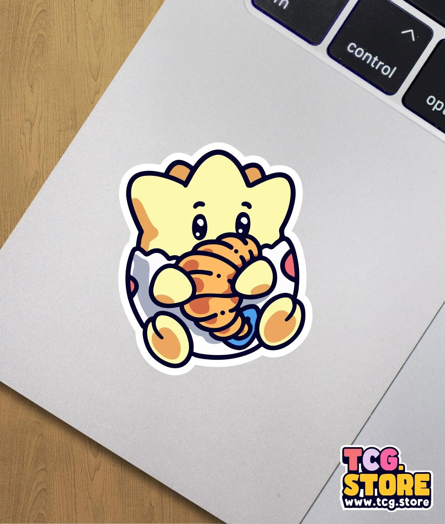 a sticker of an elephant holding a piece of bread