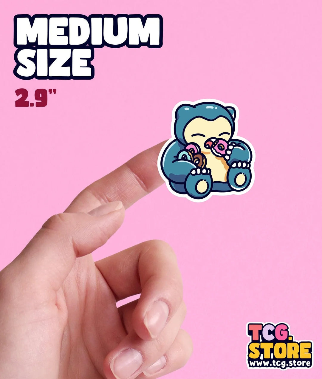 a hand holding a small blue teddy bear sticker