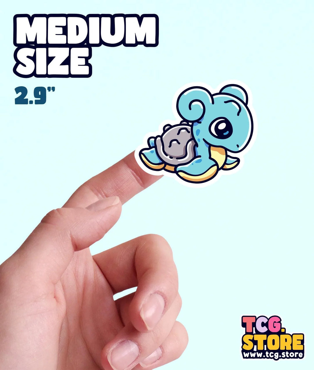 a hand holding a small blue elephant sticker