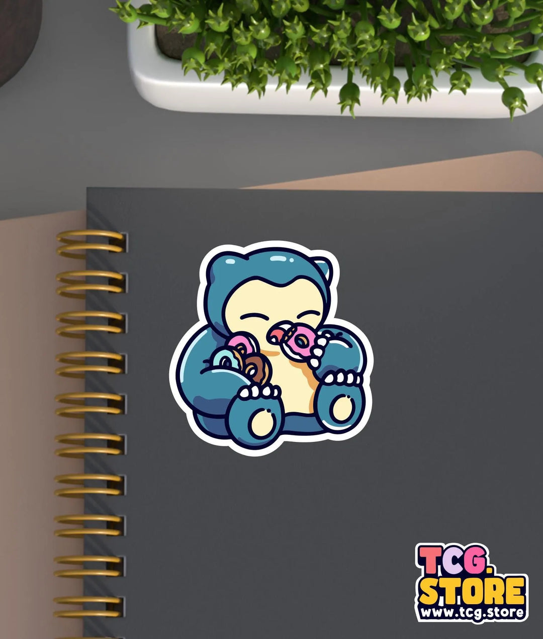 a notebook with a sticker of a bear holding a teddy bear