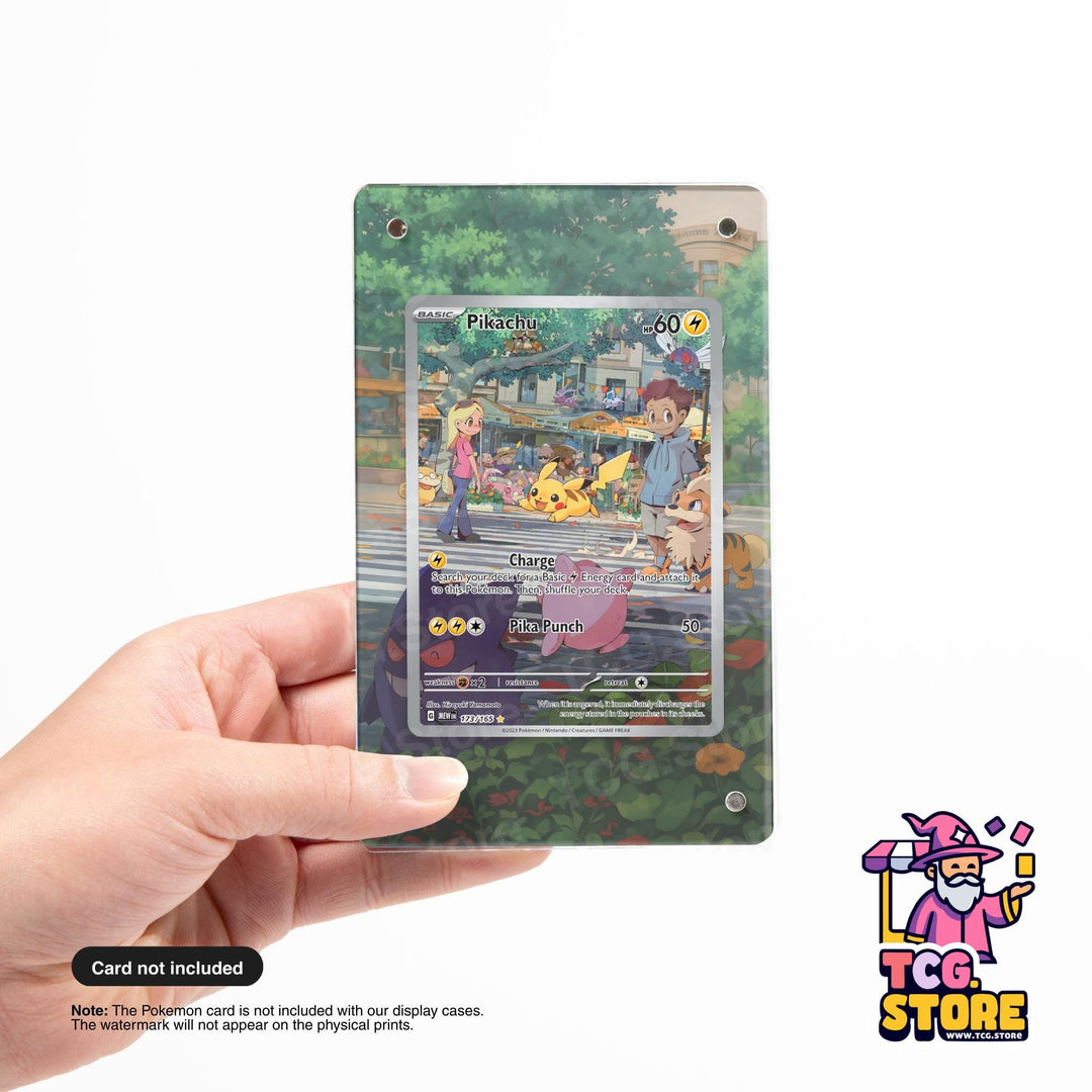 A person is holding a Pokémon trading card featuring a colorful illustration of a Pokémon character and a Pokémon-themed background.