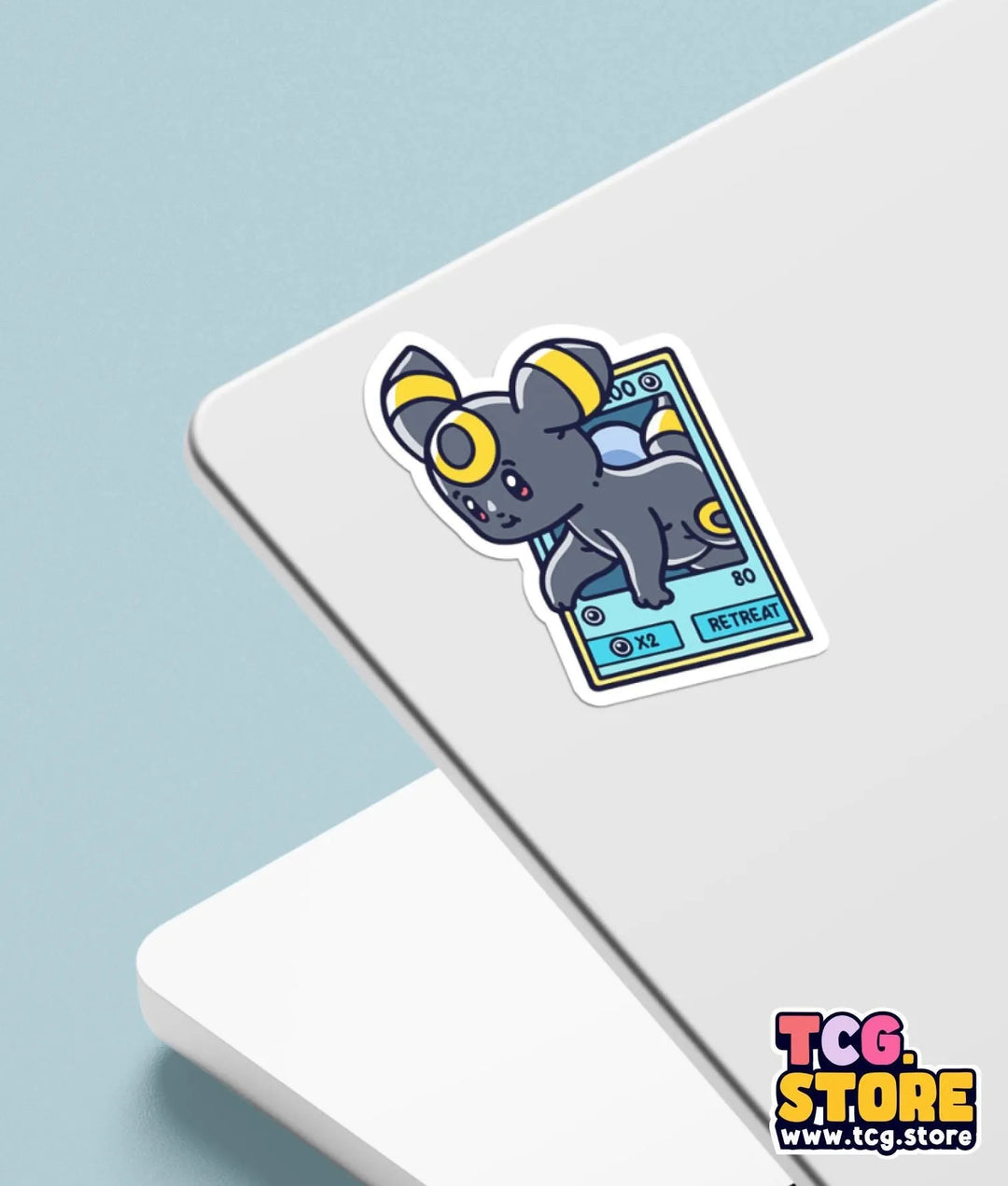 a laptop with a sticker of a mouse on it