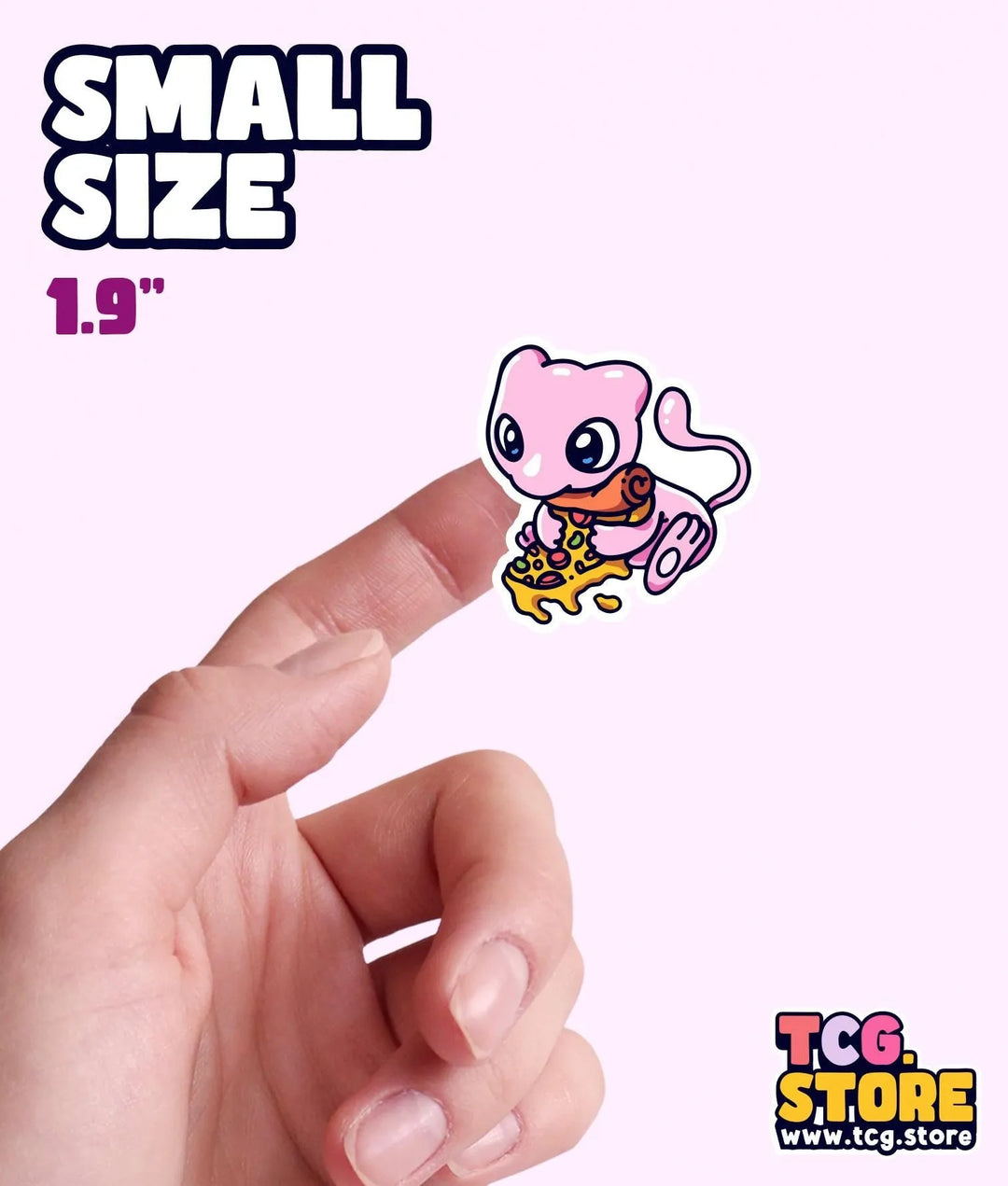 a hand holding a small sticker in front of a white background