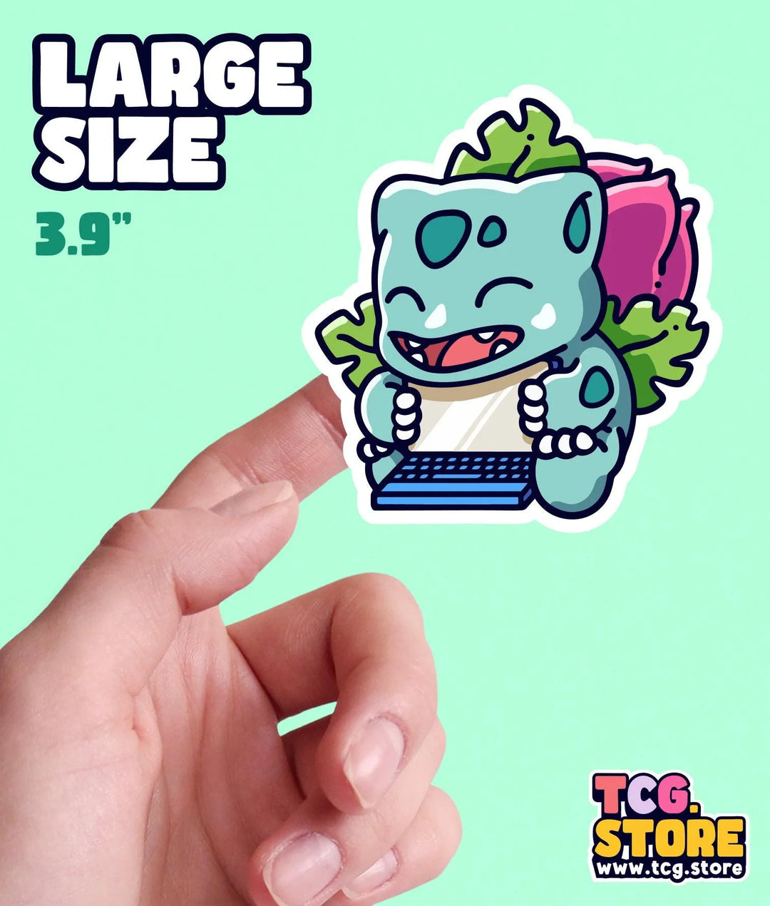 a hand holding a sticker of a cartoon character