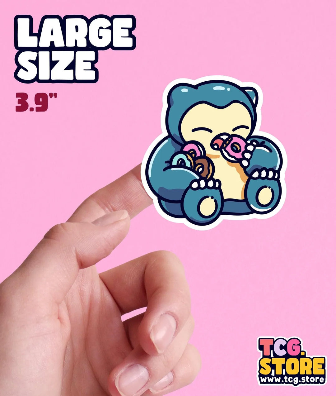 a hand holding a small sticker of a teddy bear